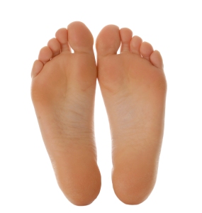 adult size feet isolated on white background
